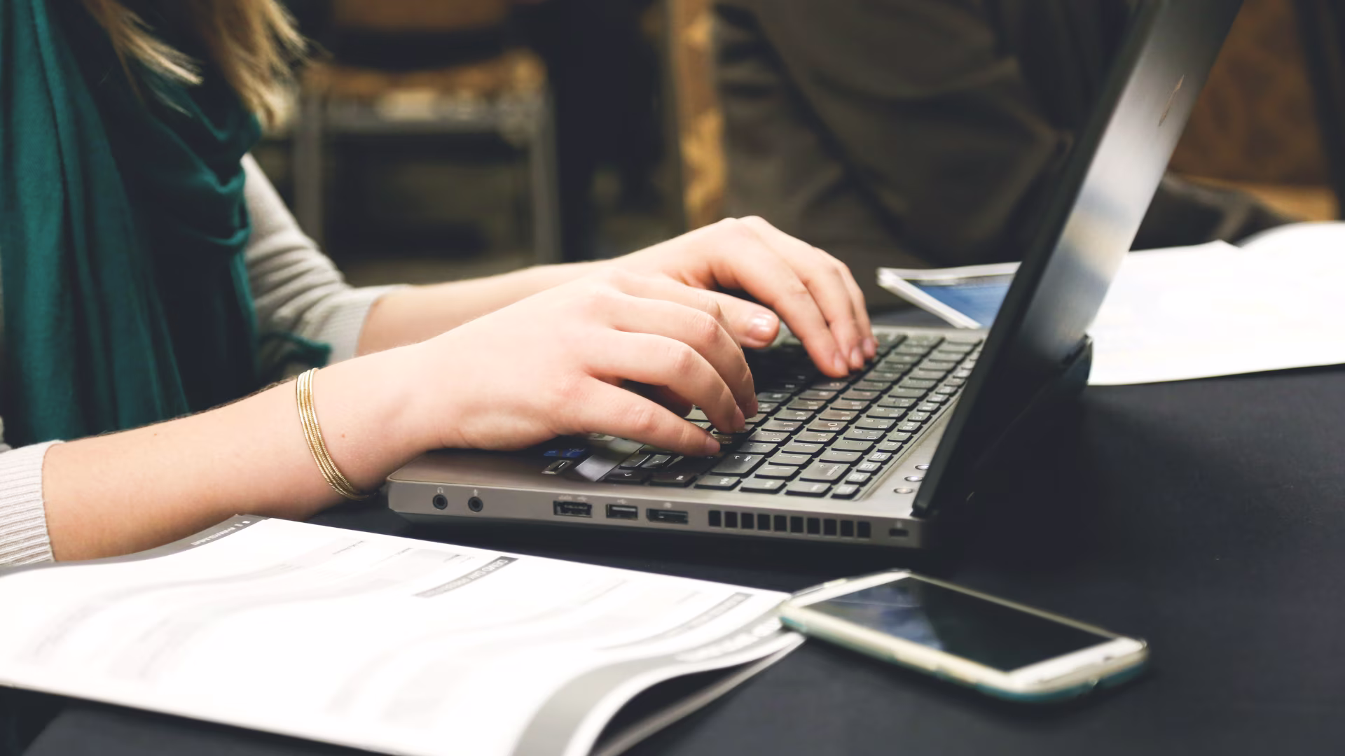 Woman copywriting on a laptop