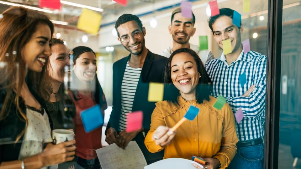 Group of People Brainstorming with Post-Its