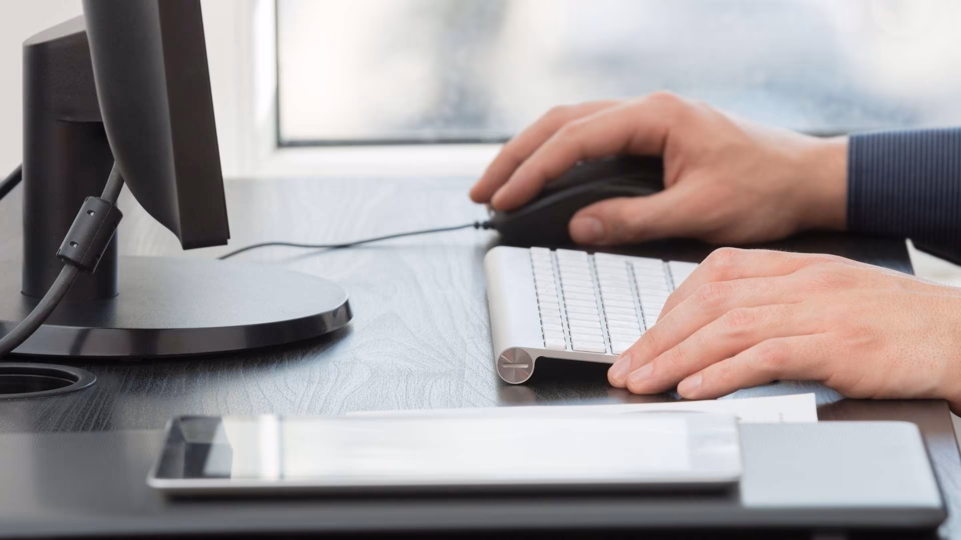Guy uses Keyboard and mouse