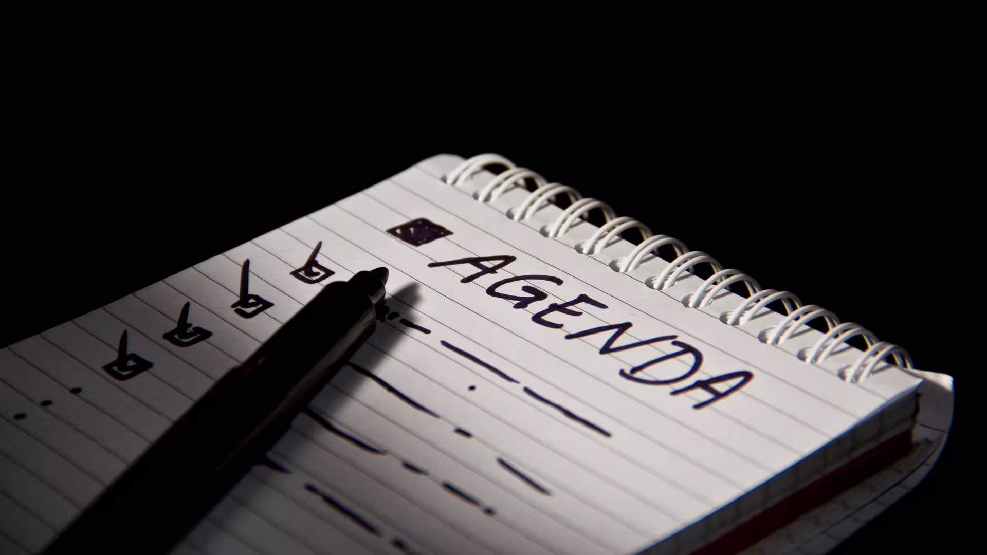 meeting agenda on a piece of paper